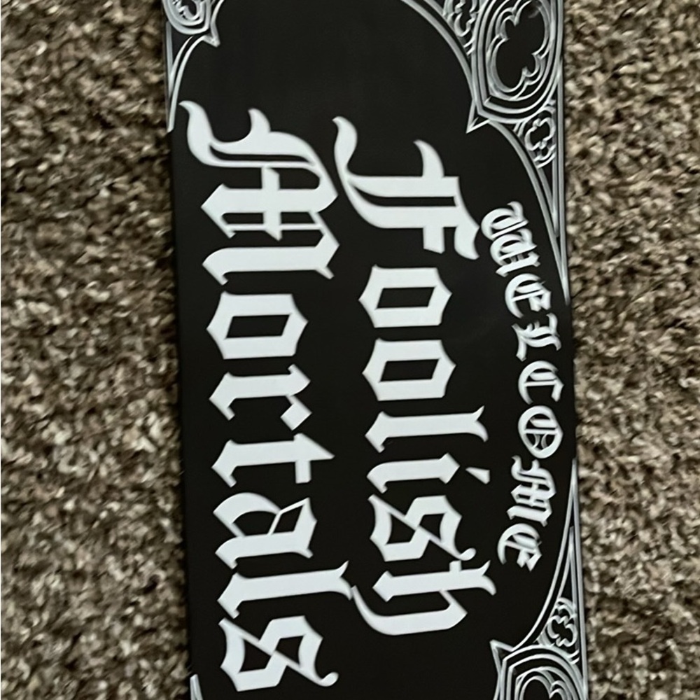 Black and White 'Welcome Foolish Mortals' tin sign